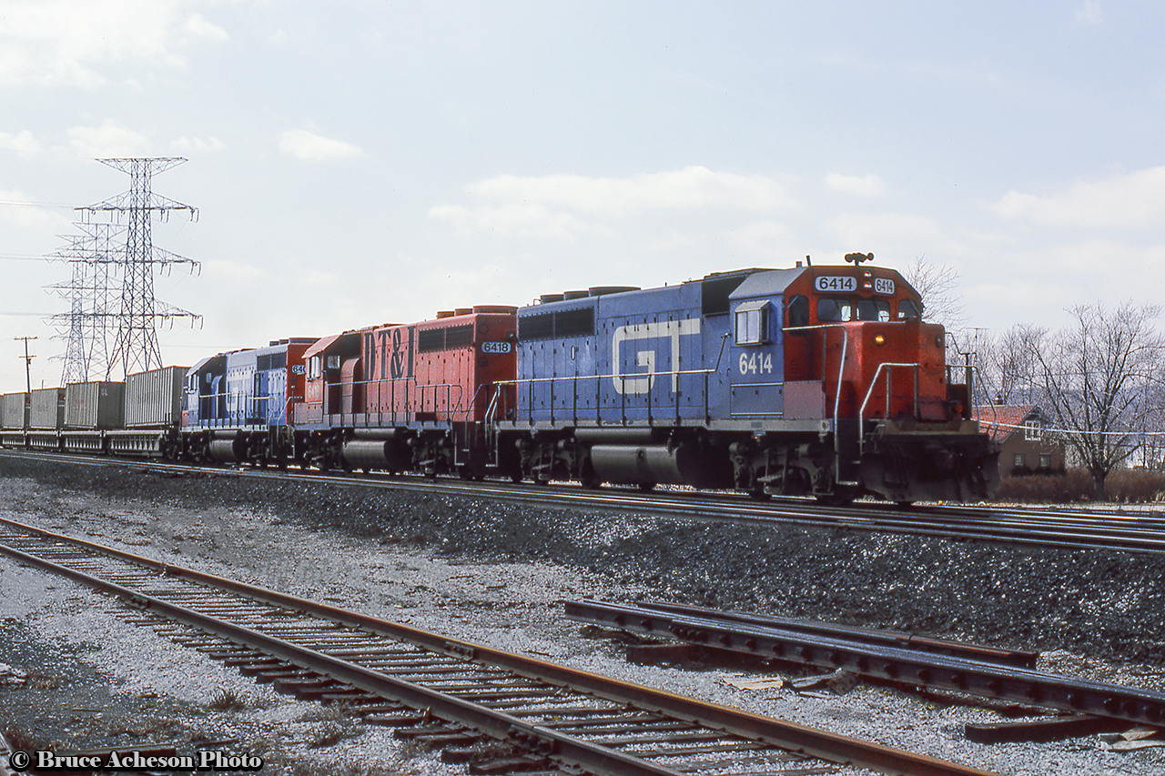 With it’s usual lashup of GTW power, CN 238, the Laser, heads east towards the Halton Sub at Burlington West.