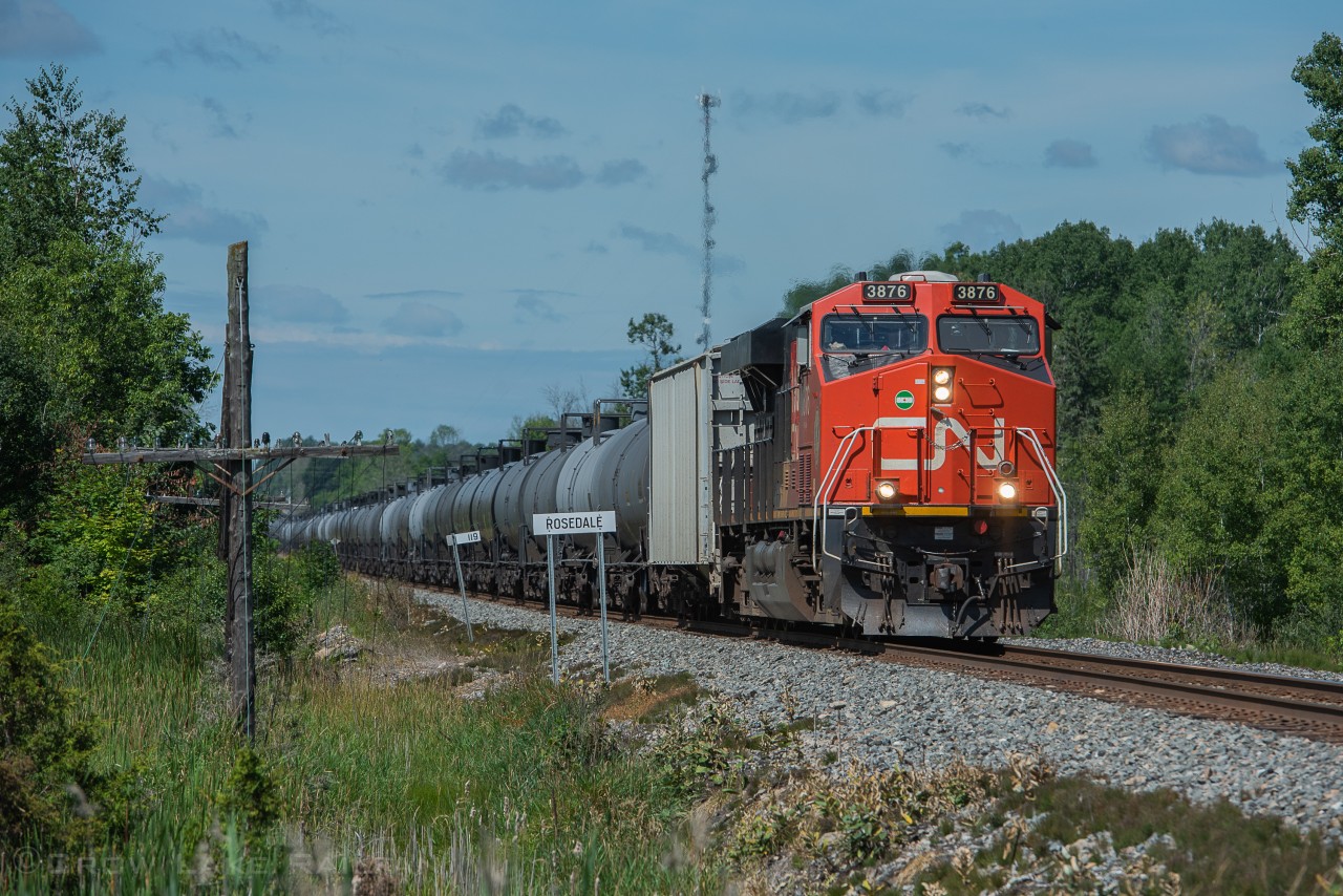 A CN unit leads CP 528 with ethanol loads to Albany passing CP Rosedale on the Winchester subdivision.