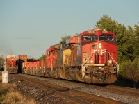 Clear skies were in the forecast as CP 133 departs Smiths Falls passing 112 on the left. It had unknown delays on the Winchester sub coming from Montreal pushing this into the golden sunset light.