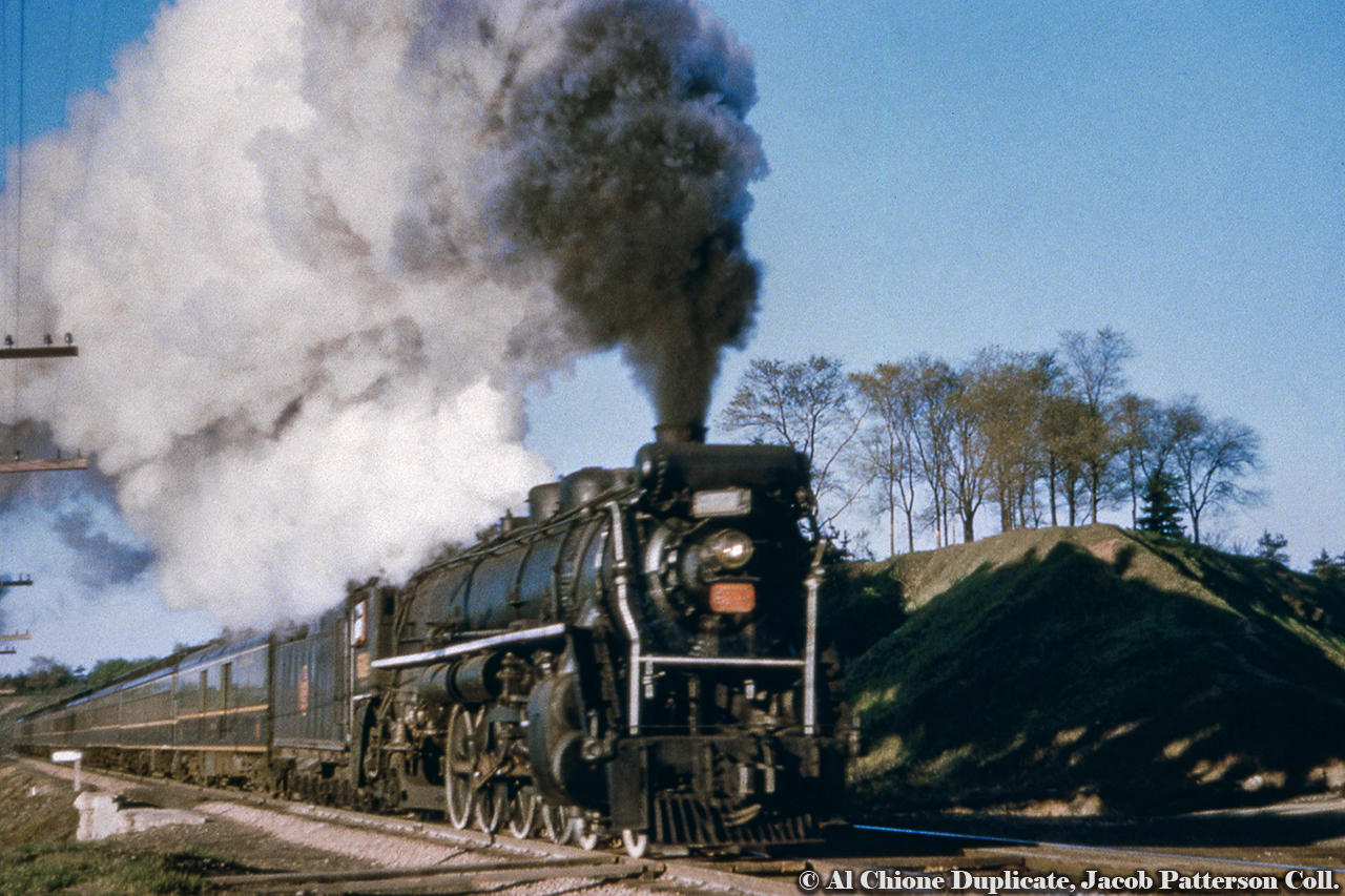 A  6000-series Mountain type leads an eastbound through Bayview Junction for Toronto.Original Photographer Unknown, Al Chione Duplicate, Jacob Patterson Collection Slide.