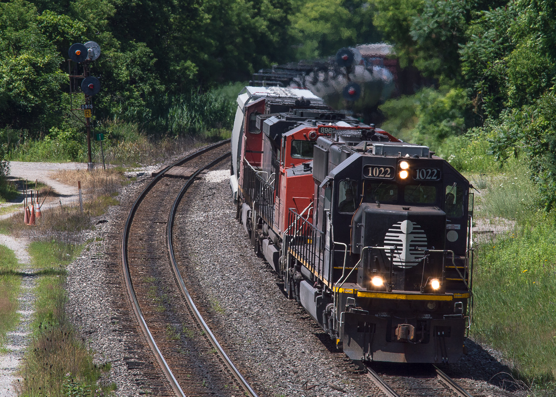 CN 396 cruises through Copetown behind the IC 1022.  The friendly crew gave a few horn blasts as they approached for the young family who was waving beside me.