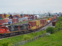 In early June 2022, CN 2131, one of 22 remaining C40-8s in captive service on the DMIR, managed to escape Minnesota and somehow led CN 148 into Brampton on a rainy afternoon. Almost every railfan along the Strathroy, Dundas, Oakville and Halton subdivisions went out to document what is possibly the last CN C40-8 leader on a stack train.