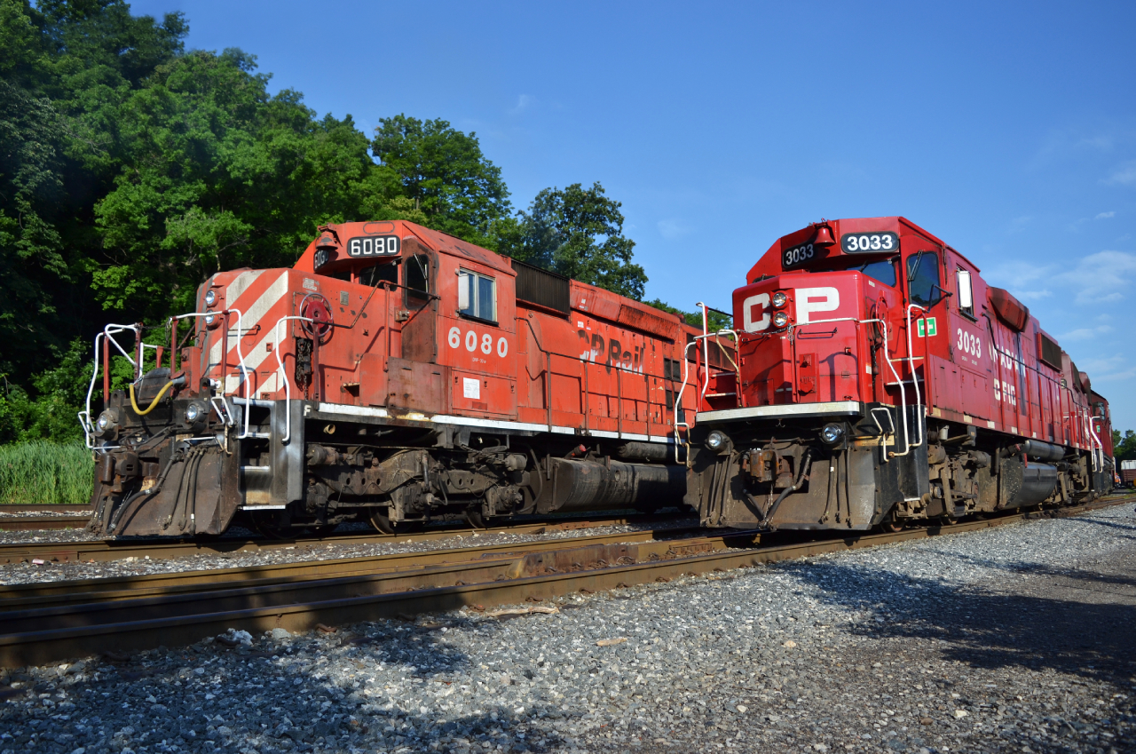 3033 pulls up next to 6080 on a beautiful and quite eventful Tuesday. Hoping 6080 would leave early for some great photos on the Hamilton Sub. Afterwards, wait for ONR in St. Catherines, things don't always work out. After waiting a few hours to see what the spray train would do, I finally bugged out to wait at Merritton for ONR 300. They would finally leave just prior to 11:30 and reach Welland, just before 13:15.