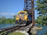 Not exactly a surprise run to many enthusiast's in Southern Ontario. ONR 1802 works its way slowly over the old Dain City lift bridge over what was the old Welland Canal. This will be my first photo attempt to recreate Michael Klauck's photo ( http://www.railpictures.ca/?attachment_id=44449 ) Wabash 657 at this location, only a 58 year difference. Although the bridge hasn't changed much, the brush sure has. As well, the Dain City tavern is unfortunately no more. 