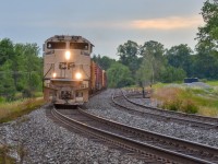 An SD70ACU duo roars past Mt Pleasant Road in Palgrave with a large 421 in tow and Arid Regions military tribute unit 7021 on the head end. 