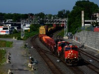 ES44ACs CN 2871 & CN 3879 lead recently revived intermodal train CN 122 (Chicago to Halifax) through Montreal West.