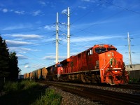 After holding for VIA 39 (for the second time on its run), CN 401 is on the move with EJE heritage unit CN 3023 & CN 3222 for power.