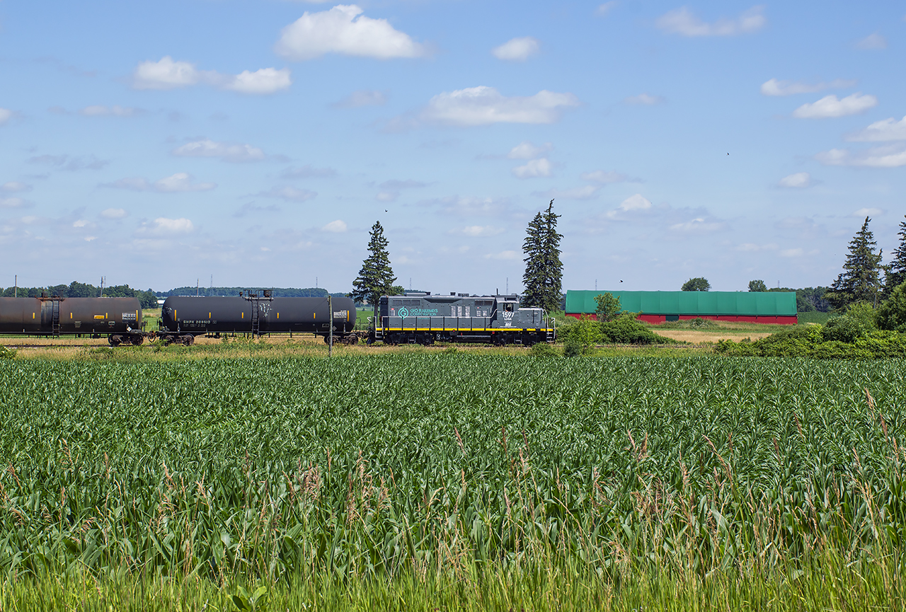 Nearing the end of the line at Tilsonburg, GIO Rail's GP9 1597 trundles along the Cayuga Sub with two tank cars in tow for Future Transfer.