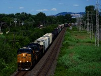 CN 327 has CSXT 815, CSXT 7212 and 91 cars as it heads west on the Kingston Sub.