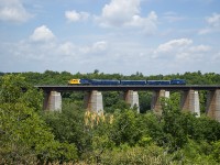 Headed to Port Colborne on Trillium Railway to take part in a film shoot for the TV series "The Handmaid's Tale," ONR 1802 leads three coaches and APCU 221 over the Credit River at Georgetown.  Having made it's way south from Huntsville earlier in the day, P300 was held for a number of meets and finally a crew change at Snider West before getting under way again.