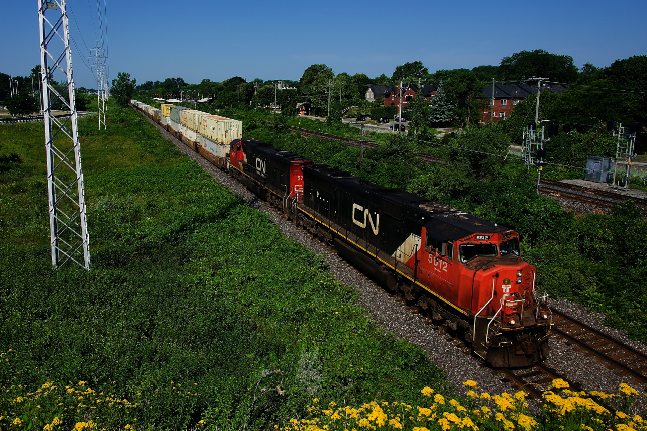 CN 5612 & CN 5794 lead CN 106 through Pointe-Claire.