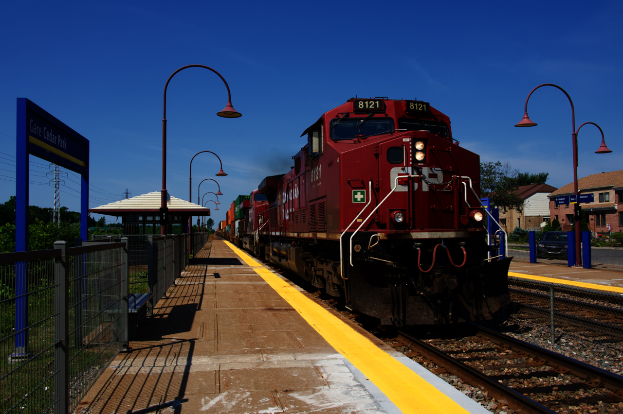 CP 118 flies through Cedar Park Station with CP 8121 & CP 8918 up front and CP 9375 mid-train.
