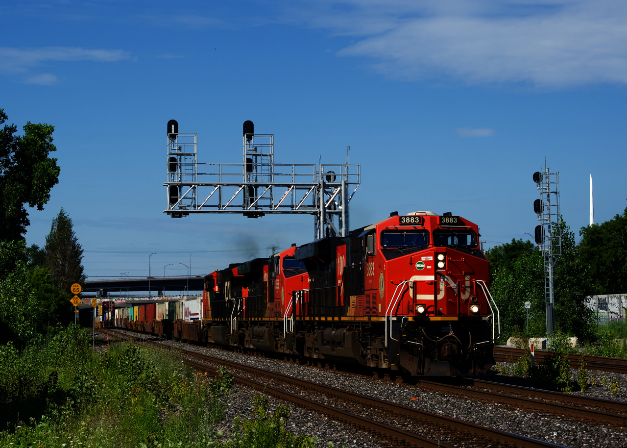 CN 3883, CN 3888 & CN 3001 lead CN 120 eastwards.