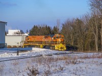 Finished their work in Guelph's north industrial park for the day, GEXR 582 shoves around the wye and across Woodlawn Road to head south for Guelph Junction.