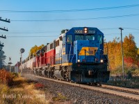 During a circuitous road trip through northern Ontario in 2010, Kyle Stefanovic and myself stumbled across OVR's "The Grimmer". Bound for the Tembec paper mill in Temiscaming, Quebec we decided to find the closest thing to a north-south stretch of track for the best possible light and Birchs Road near Nippising Junction fit the bill. RLK GP38 2002- GEXR GP38AC 3835 and GEXR GP40 4019 head up the train with a healthy mix of slurry tanks, boxcars and chemicals for the mill. Less than a year previous (December 2009) CP had stopped operating their bridge intermodal traffic over the line. Today Genesee and Wyoming operate the last vestiges of the CP North Bay Sub and the branch up the the mill in Temiscaming (as well as the Cartier Sub to Sudbury(Coniston).