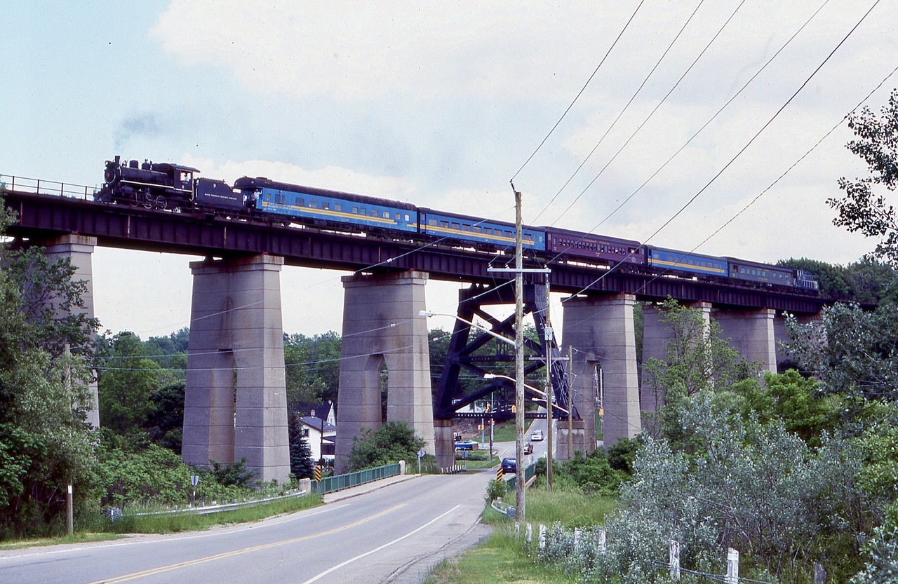 I remember this day well. I brought my parents down for the “Rhubarb special” train to Shedden., with ETR 9 doing the honours.  My dad has always had a love for steam, especially considering his father worked for CP at West Toronto maintaining the steam engines there. I decided this day to let my parents ride the train and I would follow in the car taking as many photos as possible. I’m glad I did as this entire section of track has now lost all rails. The CASO bridge on the west side of St. Thomas is definitely a show piece, with or without rails.