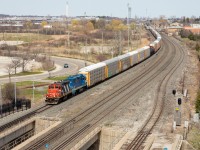 CN 4102 leads L554 West out of Oakville Yard with no stops along the way to Aldershot.