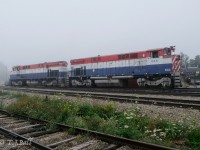 Fog shrouds the morning job as they check paperwork before making up their train and heading north.