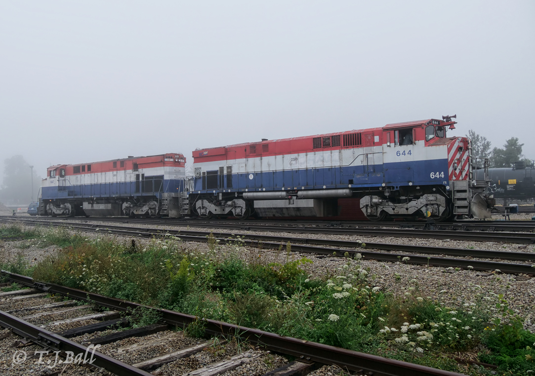 Fog shrouds the morning job as they check paperwork before making up their train and heading north.