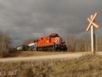 Under threatening skies, the southbound OSR approaches the crossing at Sideroad 15 in Puslinch Twp.