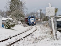 Heavy, wet snow from the night before greets 542 as they run their power around the wye at Guelph.