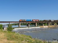 On a beautiful, sunny morning CN 580 crosses the Grand River in Caledonia, ON.