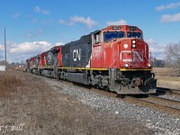 CN 148 flies through Lynden on the first full day of spring.