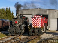 MLW cousins from different generations, the ETR 9 (built in 1923) and the 6593 (built in 1957) share track at the WCR shops in St. Jacob's.