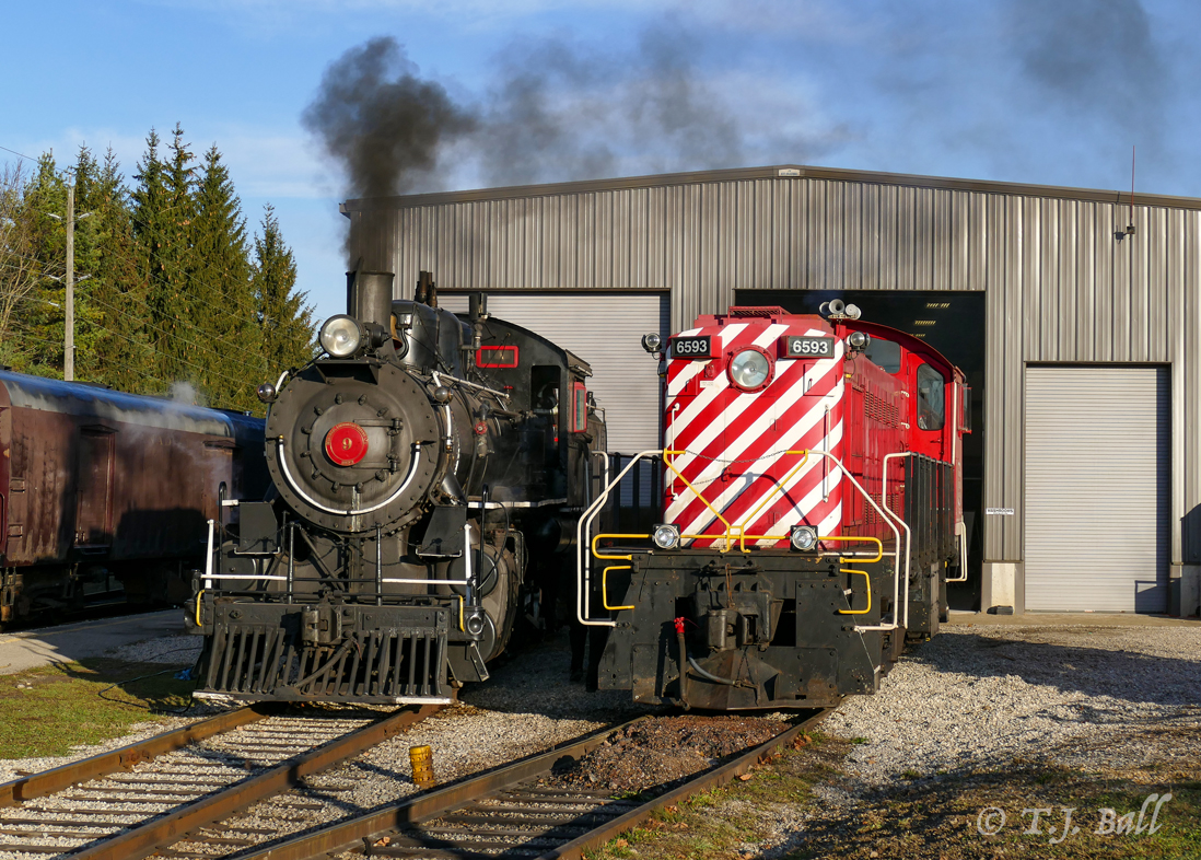 MLW cousins from different generations, the ETR 9 (built in 1923) and the 6593 (built in 1957) share track at the WCR shops in St. Jacob's.
