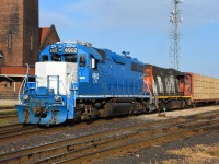 CN 4902, one of the better looking ex. GMTX GP38-2s, is on the front of CN 580 as the crew begins their day switching out a cut of cars that arrived in the night.   