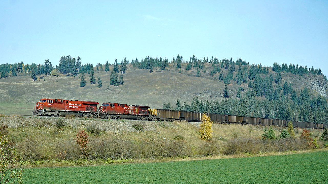 ES44AC CP 8855 and AC4400CW CP 8558 work a west bound coal train towards Notch Hill.  On the grade reduction loop but still a slow hard slog up the grade.