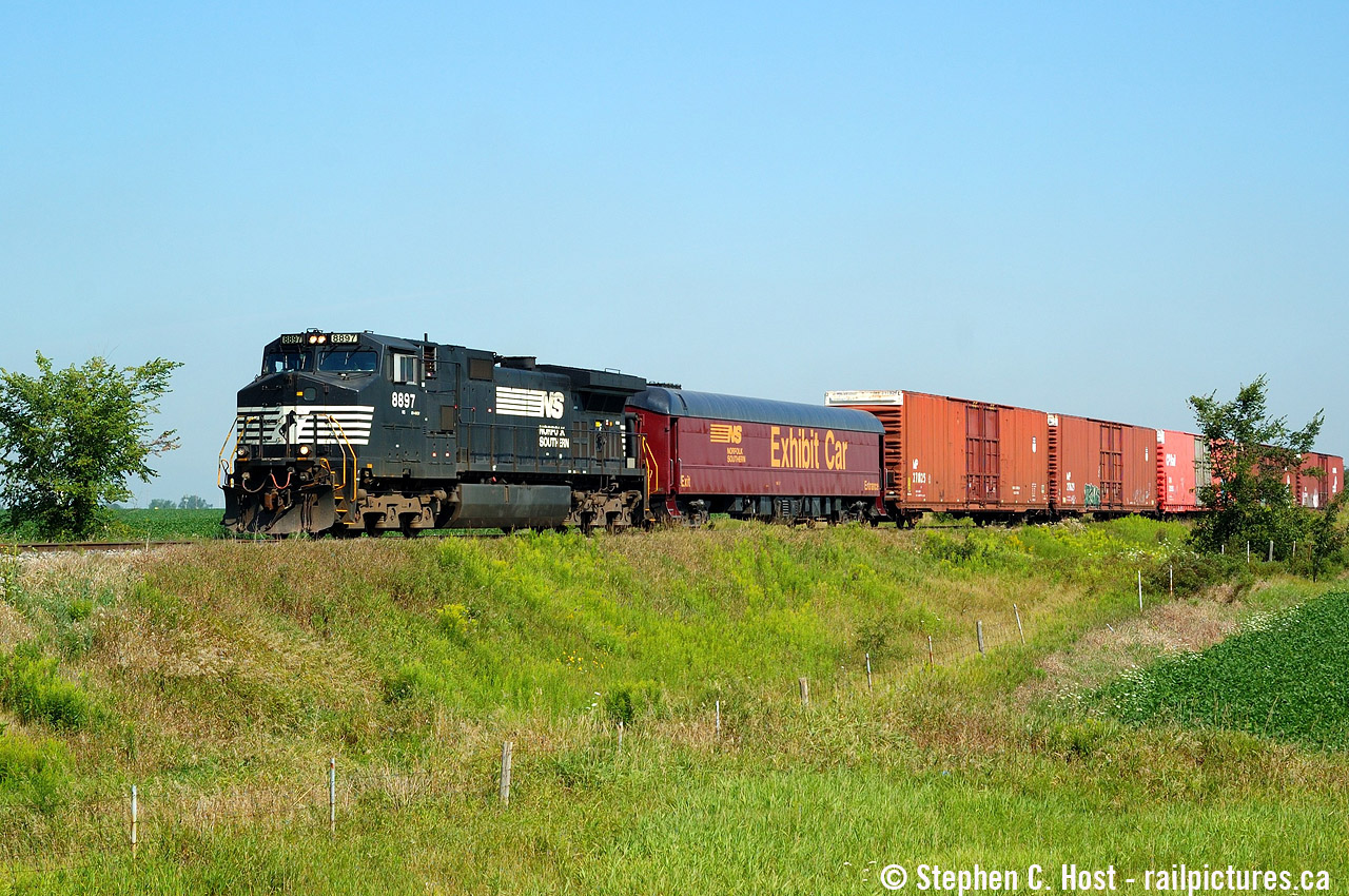 Back to my oldies, we were given a heads up this exhibit car was coming for Railway Days in St. Thomas, so I chased down the Talbot sub a bit. This picture shows the entire train, only 5 revenue cars from Ford Buffalo Stamping on the South Buffalo Railway. NS would drop this car in the St. Thomas yard before heading to Talbotville. Pity the motive power, which at the time was very boring, but alas, you get what you get.