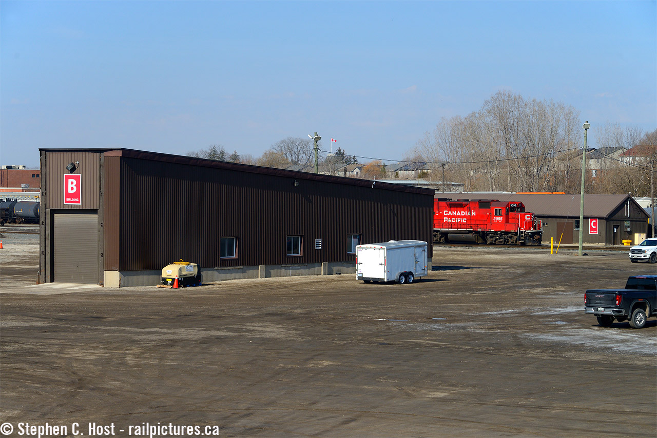 While at first glance the buildings in the foreground may not be much to look at.. when you realize "Building B" is a single stall of the Quebec St Roundhouse still standing,it kinda intensifies the interest a bit.

When Hunter Harrison did a system tour in 2013 all of the buildings were labelled and the yards cleaned up and paved. It is suprising he didn't order the buildings and yard removed given what Wolverton was to become and of course hunter's reputation.