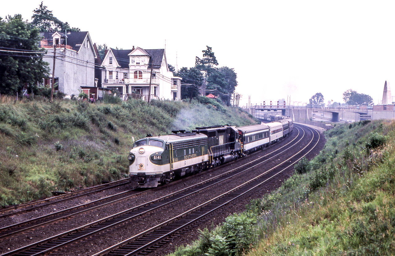 Peter Jobe photographed the N.R.H.S. International Limited in Toronto on July 27, 1980. Southern 6141 and N&W 1518 led the train west at 5:20  P.M.