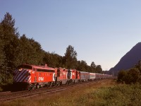 Once upon a time, CP established a terminal at mile 47.9 at Ruby Creek to serve crews and equipment from the Coquihalla sub. junction a few miles to the east, and it became the east end of double track when that was installed.  With the passage of time, the Coquihalla connection was shut down, and later the end of double track was relocated west to mileage 51.7 at new Ruby Creek.  This shot of No. 2 The Canadian on Sunday 1978-07-30 at 1815 PDT passing milepost 48 was taken from the site of the former wye west switch at old Ruby Creek.