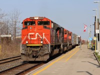 After getting my DSLR the previous day, I was put to the test, and given a high headlight SD70M-2 leading CN A421 in nice light. Having an 8000 series SD70M-2 lead this train is rare these days, so I am glad it turned out and the sun was out. It is seen here passing by the St.Catharines station on the CN Grimsby sub's north main track.