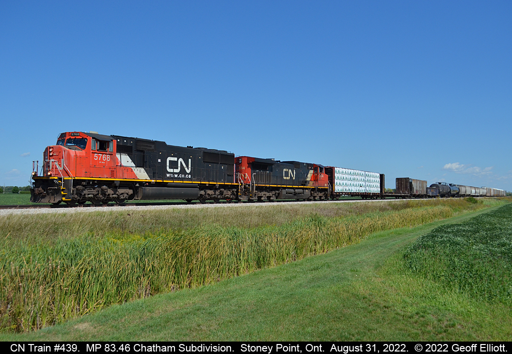 CN Train #439 is slowly getting up to speed as it has just left the siding in Stoney Point, Ontario after meeting VIA Train #76.  #439 is a short train today and was able to fit in the siding allowing #76 to go by at speed and not incur any delays.