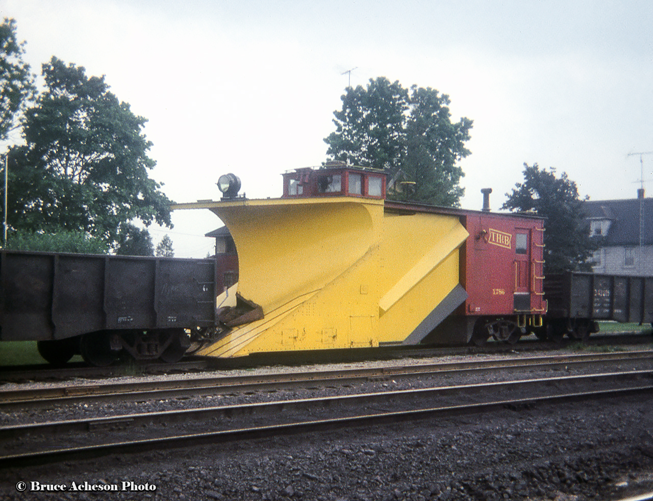 TH&B's Russel plow X786 seen waiting for winter at Aberdeen Yard.  Bruce Mercer was able to grab a few shots of the plow in service (1) at Brantford (2).