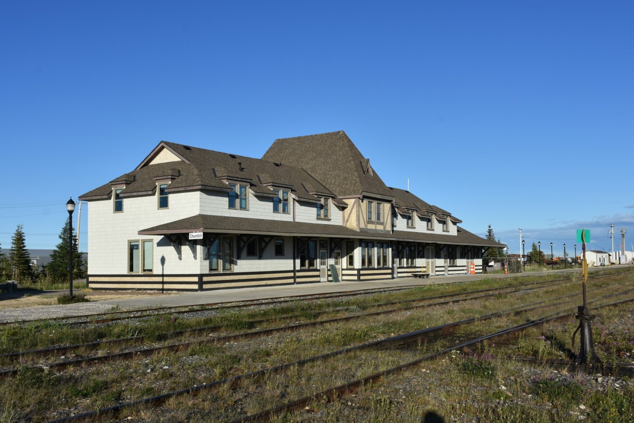 Churchill, MB station is looking spectacular these days as evidenced by this shot I snapped last week after a two day ride on VIA Rail #693 from Winnipeg. While there is a small waiting area inside for passengers, and a single wicket for the VIA Rail agent during train arrival & departure times, the rest of the building, both main and upper floor are occupied by Parks Canada personal. The station interior has been completely renovated and even has an elevator to the second floor where Parks Canada has offices and a conference room. The main floor houses a Parks Canada welcome kiosk, and a museum exhibiting life, and wildlife in this far north area of Manitoba.