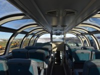 I have the entire upper level of VIA 8511 Skyline all to myself as VIA 692 begins it southbound journey from Churchill, MB on this gorgeous August 4, 2022 evening. I thought it kind of neat that as a life long career Work Equipment guy, I would roll out of town through a resting gauntlet of MoW equipment on either side of the train. A HyTracker equipment transporter, a tie changer, and rail lifter to my left, while a GREX Dump Train is powered down on my right. Even though the Budd stainless steel equipment assigned to the Churchill trains has seen better days, it did not detract from the extremely enjoyable 4 days and 4 nights spent on board. The VIA on-board crews in both directions made what could be a long, boring trip for some, into a pleasant experience for everyone. A fitting end to a wonderful trip was experiencing the Northern Lights dancing across the sky later in the evening.