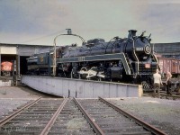 A scan of a slide taken by my late father in 1967.  It shows the 6077 being removed from the roundhouse at
Capreol prior to it being delivered to it's final resting place at Prescott Park. 