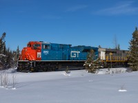 It is currently +31 in Edmonton, but soon the weather will turn and scenes like this will be common again.  The GTW Heritage unit leads Edmonton to Cadomin stone train U 72552 25 past the one mile to station sign at Mercoal, on the isolated Mountain Park Spur.  It turned out that the line was tough to chase, with very few access points, however it was a nice drive along Forestry Trunk Roads on a warm February morning.