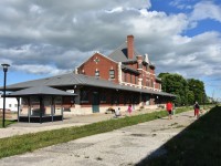 On my recent trip from Winnipeg to Churchill and return (July 31-August 6) I was able to detrain along the way, in several locations, and snap a few photos in mostly sunny conditions.
On the trip up to Churchill, Dauphin, MB was one of those spots that provided almost 30 minutes of platform time to mill about and gather a variety of pictures. The stations cornerstone, or in Dauphin's case the 'towerstone' reads CNR 1912. In addition to its VIA obligations, the station also houses the Dauphin Rail Museum.