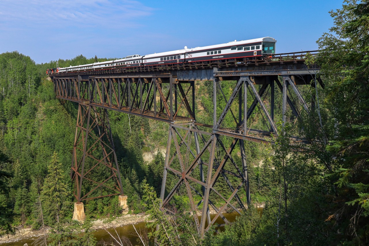 CN P 00751 23 highballs over the Pembina River at Entwistle, enroute to Jasper.
Consist was as follows:
CN 3118
CN 3178
CN 1710 - Frazier Spirit
IC 800413 - Great Lakes
IC 800210 - Baton Rouge
CN 1059 - Tawaw
CN 99 - American Spirit
IC 101315 - IC Centenial Spirit
IC 800653 - Sanford Fleming