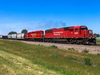 CP 6229 and 5790 highball eastward out of Lethbridge with a wayfreight.