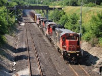 Due to the Paul M. Tellier Tunnel being down in Sarnia because of a derailment, CN rerouted many trains through the Detroit River Tunnel in Windsor. Here we see CN X328 emerging from the tunnel behind CN 2108, CN 2116, CN 8802 and GT 4919. There were a group of railfans waiting for this train, and I remember getting a nasty sunburn as we waited for it.