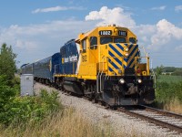 ONT 1802 leads the "Movie Train" down the Trillium between Thorold and Welland.  The trainset took part in the filming of The Handmaids Tale.