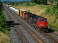 A CN Eastbound approaches Aldershot on the CN Oakville Sub on a Sunny morning in 2011.