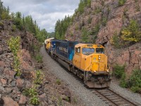 ONT 2104 leads train 308 through Boston Creek Ontario after meeting train 211 at Jardine.