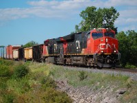 CN 531 with CN ET44AC 3074 and CN ES44AC 3810 passes through Buchner Rd. on the CN Stamford Sub bound for Fort Erie and onto Buffalo.